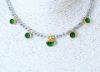 Κολιέ κοντό από επίχρυσα στοιχεία με πράσινο σμάλτο και Αιματίτη ασημί