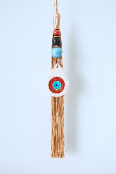 Γούρι από ροζ χρυσή φούντα, κεραμικό μάτι - χάντρες και Αιματίτη χρυσό